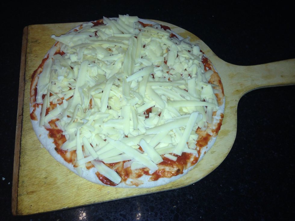 A sprinkle of dry onion flakes top of with cheese