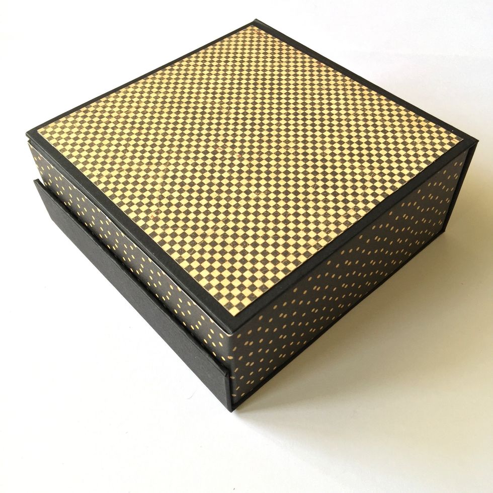 A square piece of paper for the back.