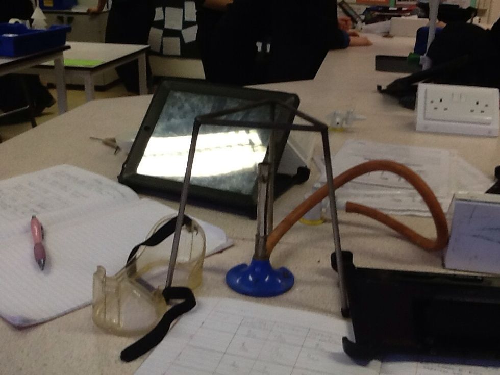 A stand with a Bunsen burner