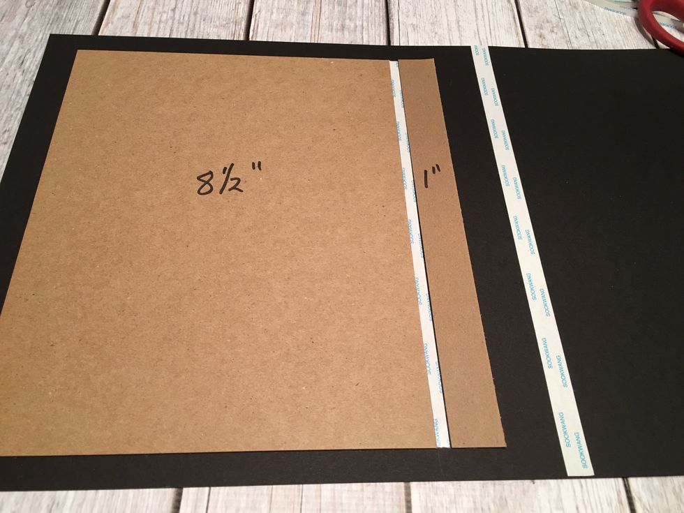 A strip of 1/4" tape is placed on to the card stock
