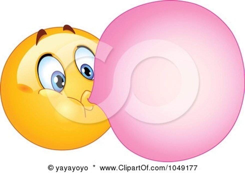 A teacher can annoy her class by blowing bubbles with her gum.