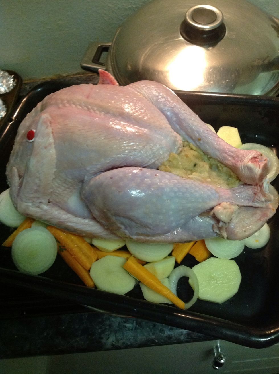 A thermostat in the turkey helps with cooking the bird. The thermostat pops up when the turkey is cooked. The bird is stuffed with a bread and mint stuffing (my moms traditional stuffing)