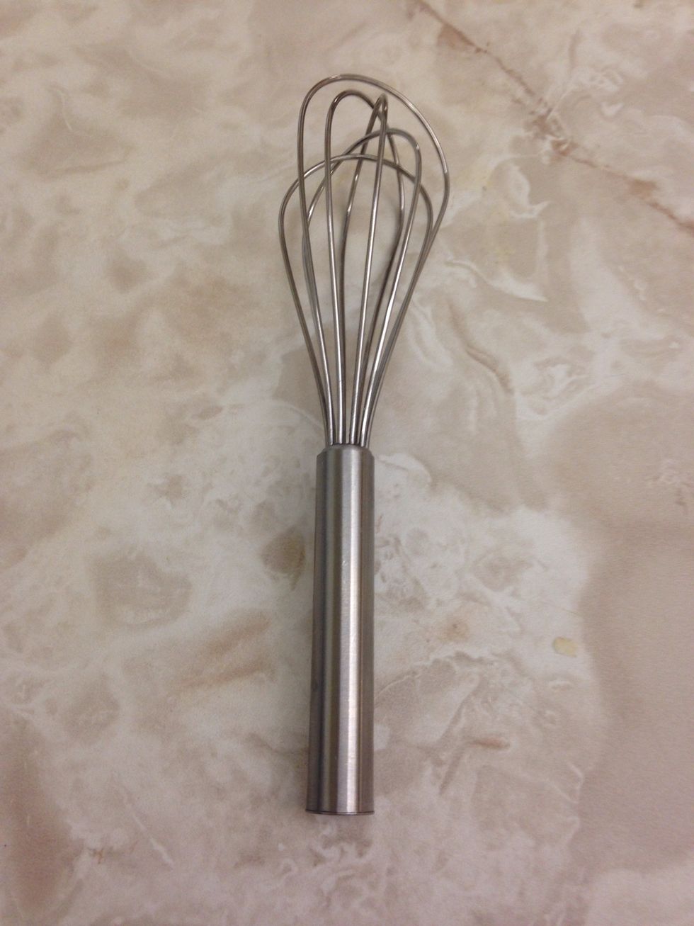 A whisk is used for stirring. I can use this to mix eggs and batter.