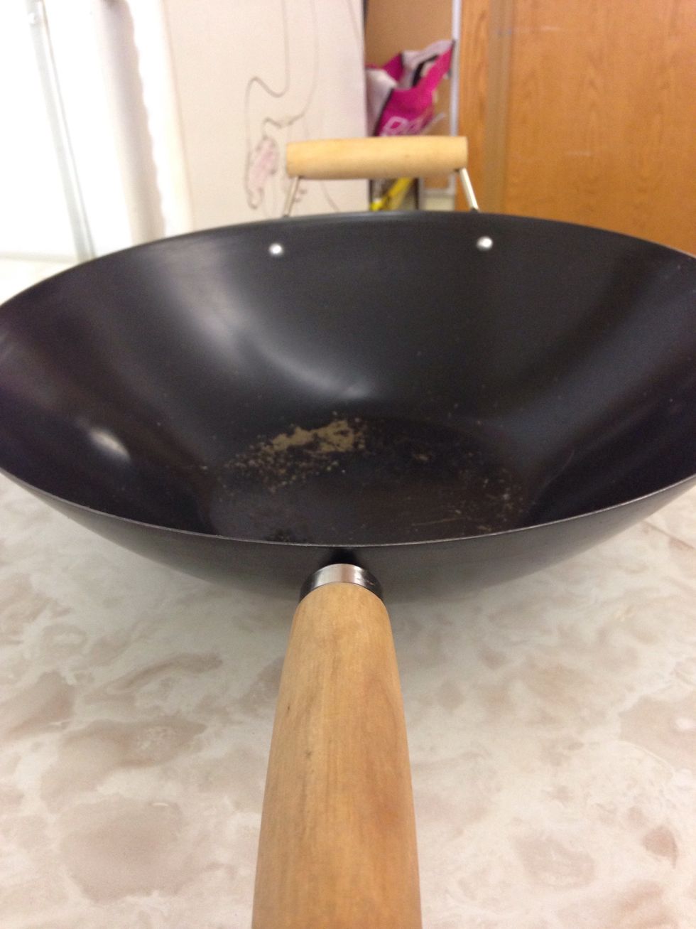 A wok is used to cook stir-fri. I can use a wok to make stir-fri.