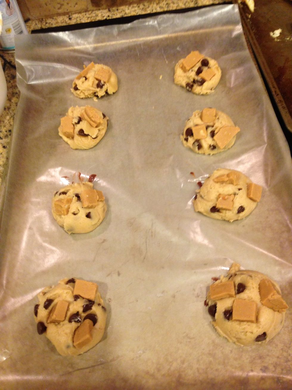 About 2 inches apart on wax paper or parchment papered baking pan.