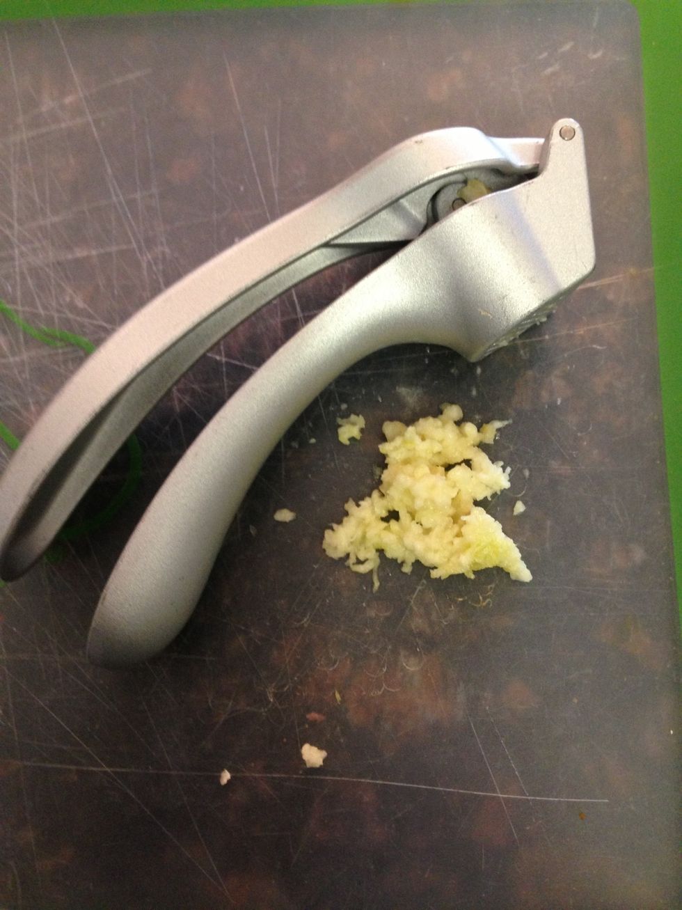 About 3 cloves garlic pressed. (1tsp worth)