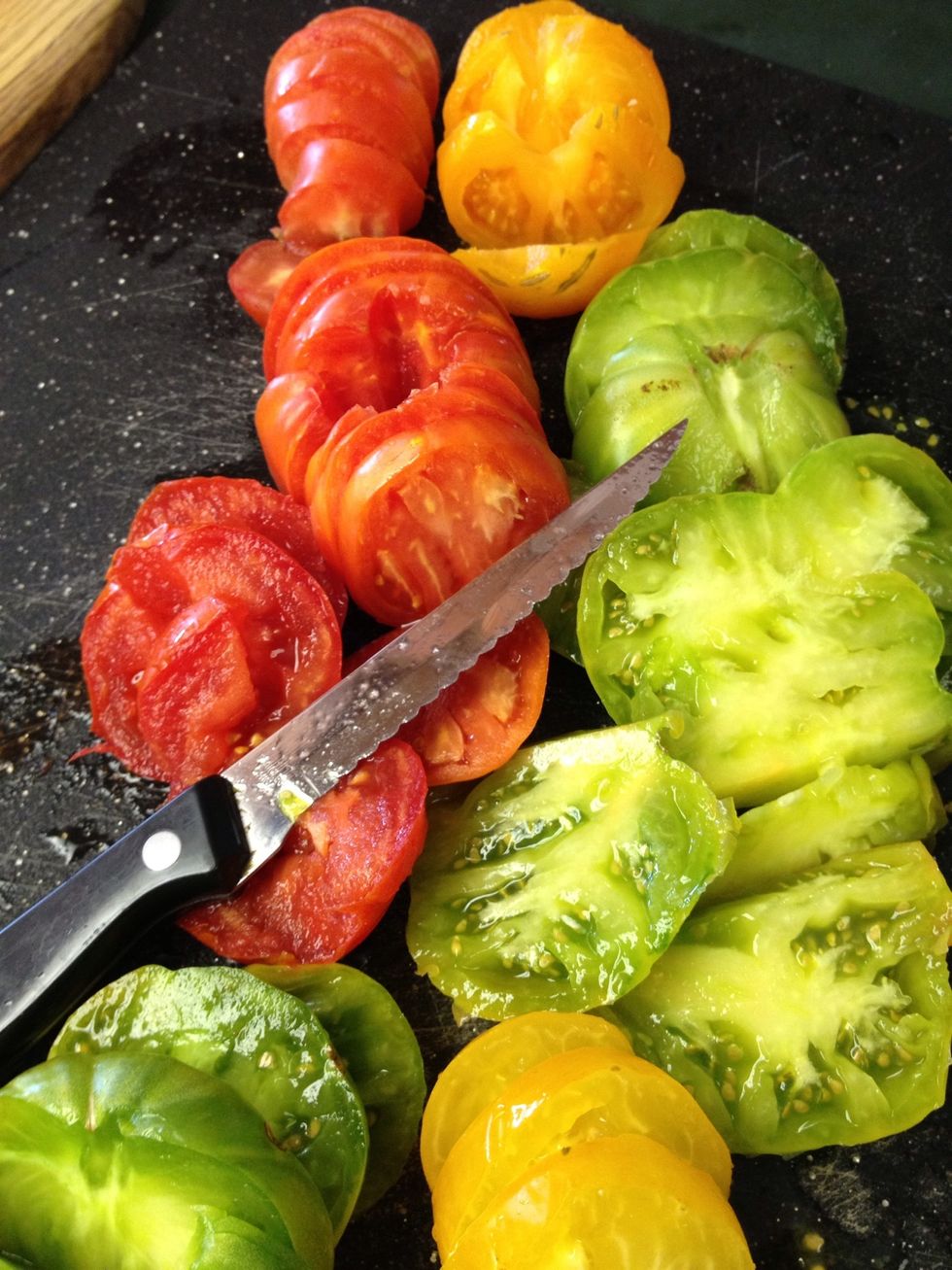 About 7 tomatoes, cored and sliced.  The recipe calls for Roma tomatoes which are firmer and less juicy but I wanted to use our sweet Farmer's Market selection.