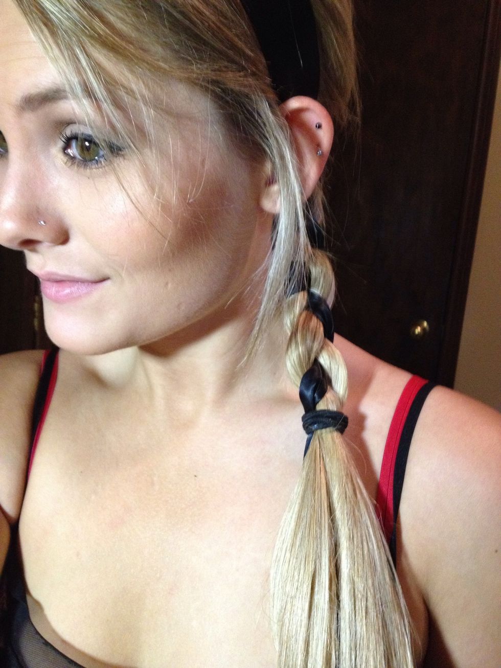 About half way down I stopped my braid. (If you like keep going just leave about an inch on the bottom ) *Tip: leave the ribbon on back of braid before you tie it. This will help with next step.