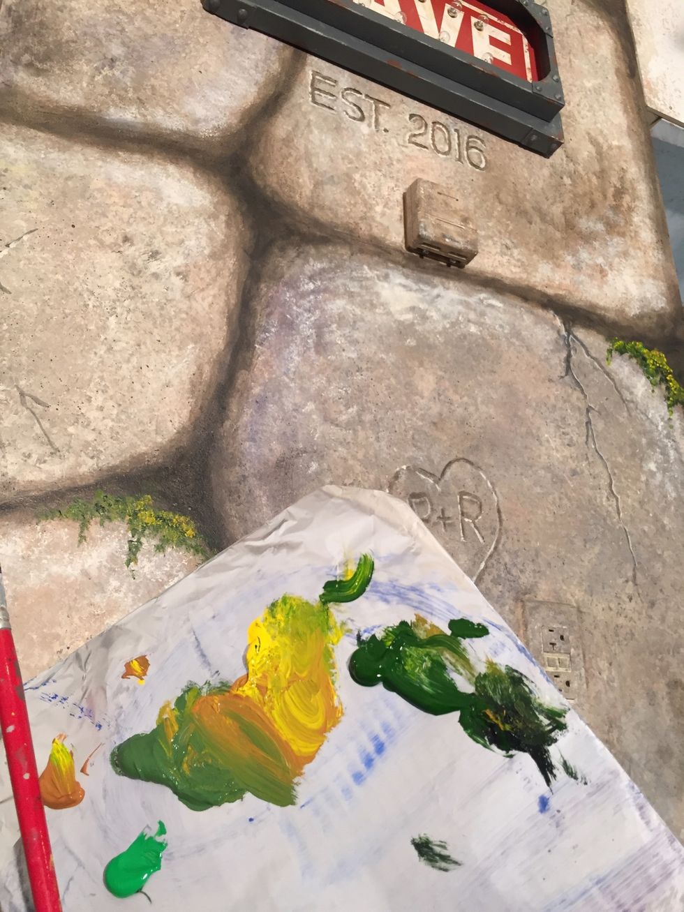 Above I added a sign I found at our local home store. With a thinner brush I painted cracks in the stones & letters to appear carved. Then artist paints to add moss with dry-brush.