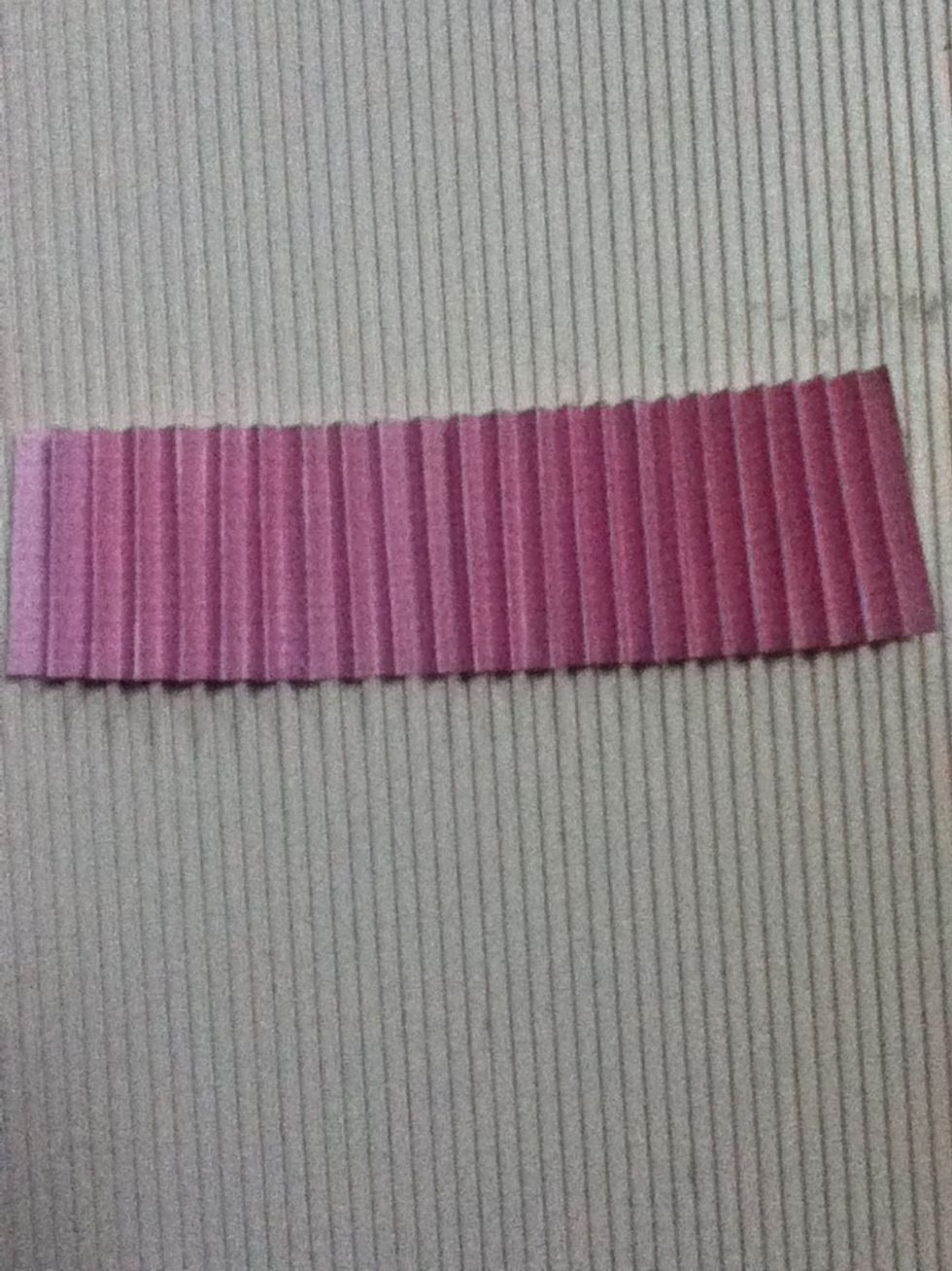 Accordion fold the paper on your scored lines.