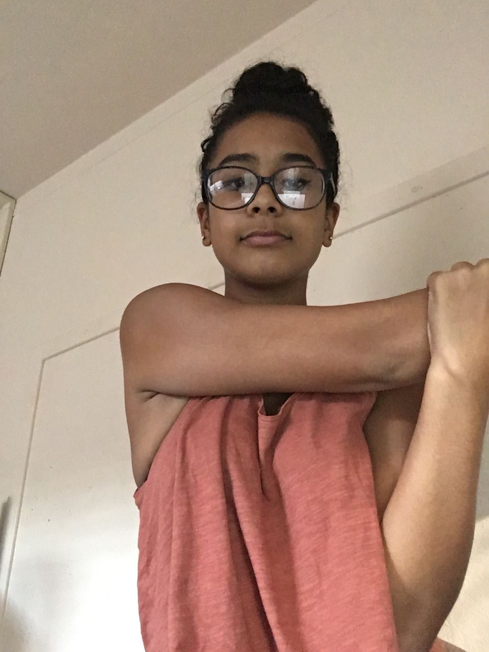 Across the body, this stretch is good for warming up your shoulders.