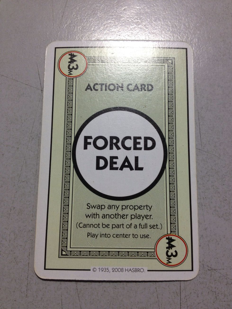 Action card: Forced deal. You're exchanging a property card with another player, so you need to offer him one of your property cards in return.
