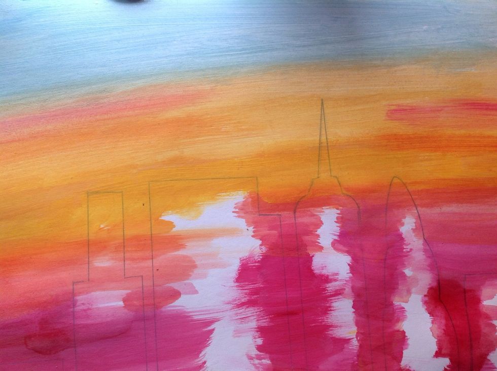 Ad bits of red, and use a dry paint brush to spread it. Then paint the remaining space blue.