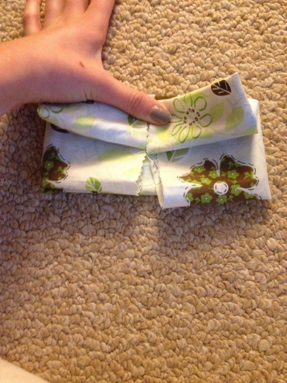 Ad fold the top half on top of the glue. Hold until dry.