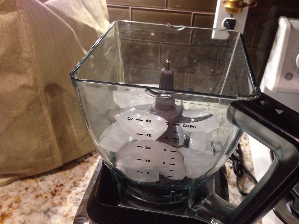 Add 1 1/2 cups ice to blender. Then add 1 cup milk and 2 tbls chocolate of your choice and blend.