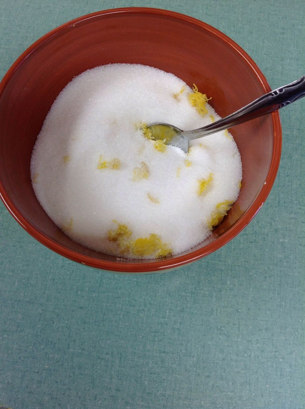 Add 1 1/2 cups of sugar with the lemon zest