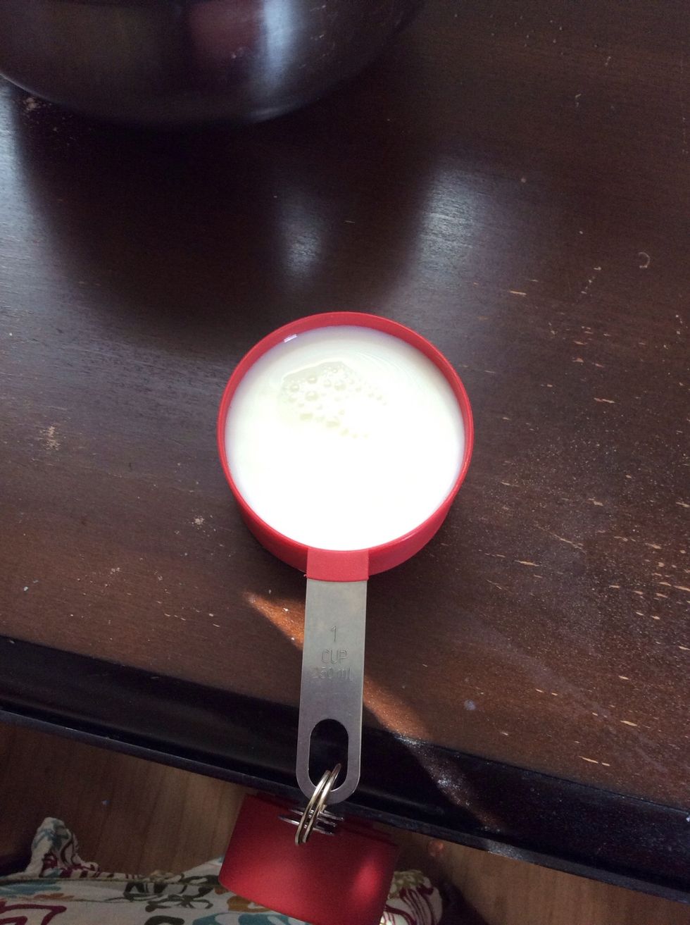 Add 1 1/4 cups of milk to the mixture .