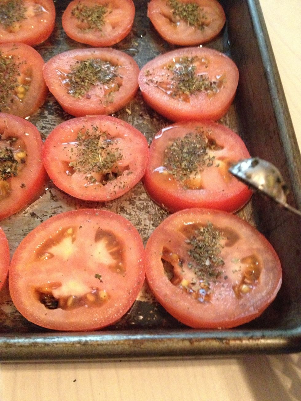 Add 1/2 a TSP of basil to each tomatoe.