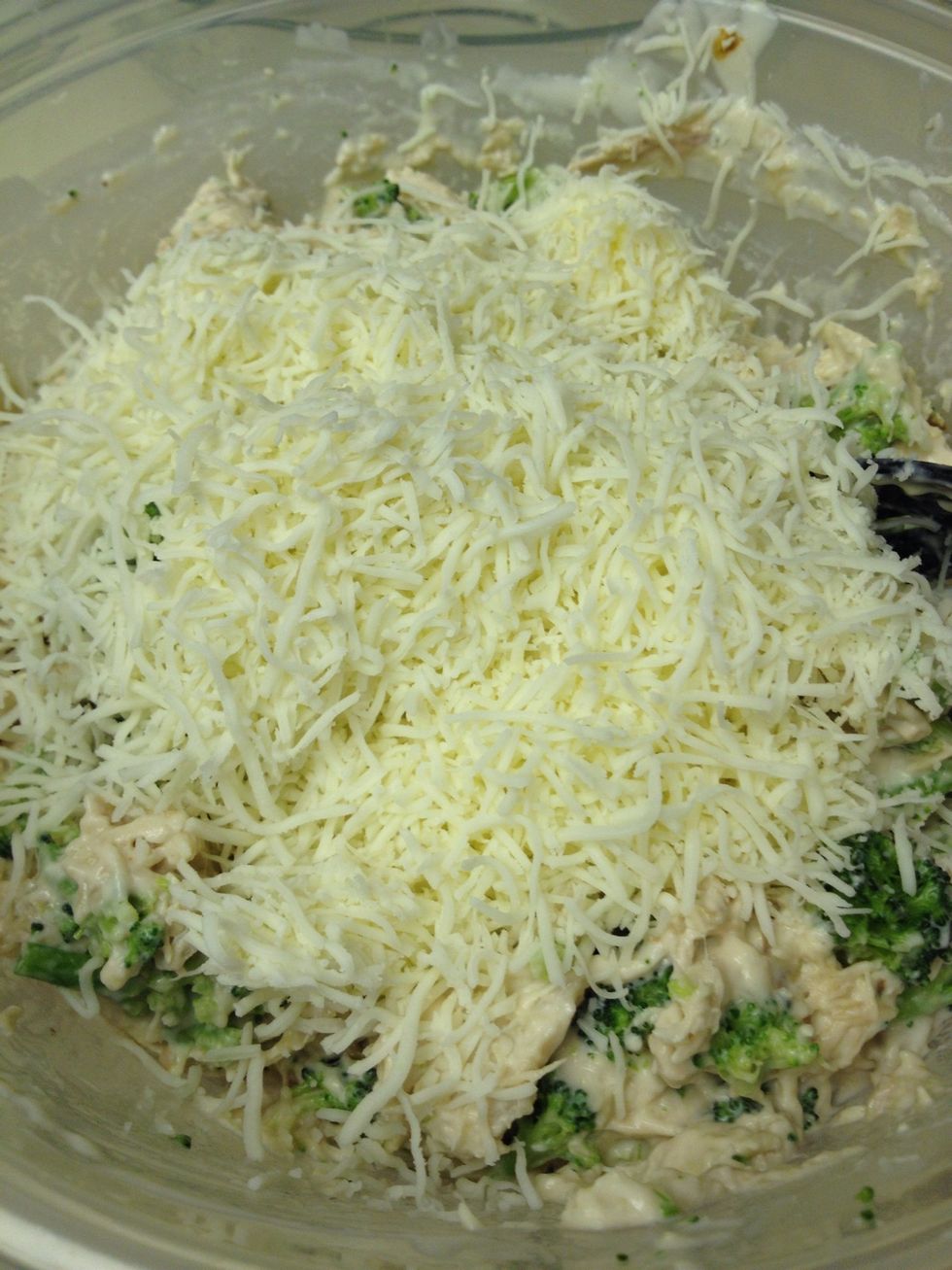 Add 1/2 bag mozzarella cheese. Mix. Add salt & pepper to taste.