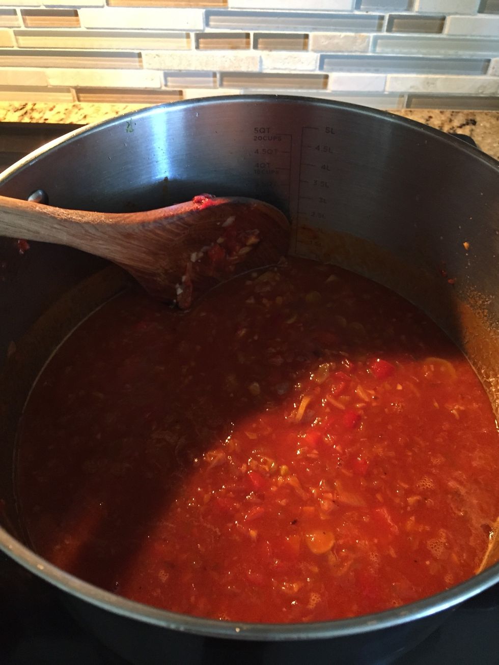 Add 1/2 bottle of white wine simmer for five minutes