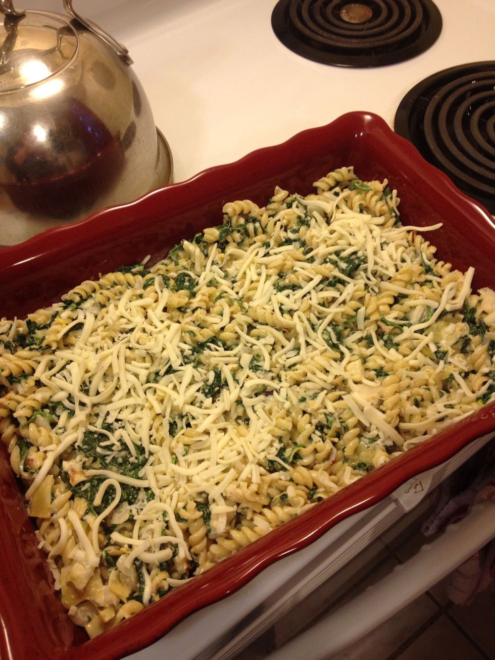 Add 1/2 c mozzarella cheese to top, place in oven for about 3-5 mins