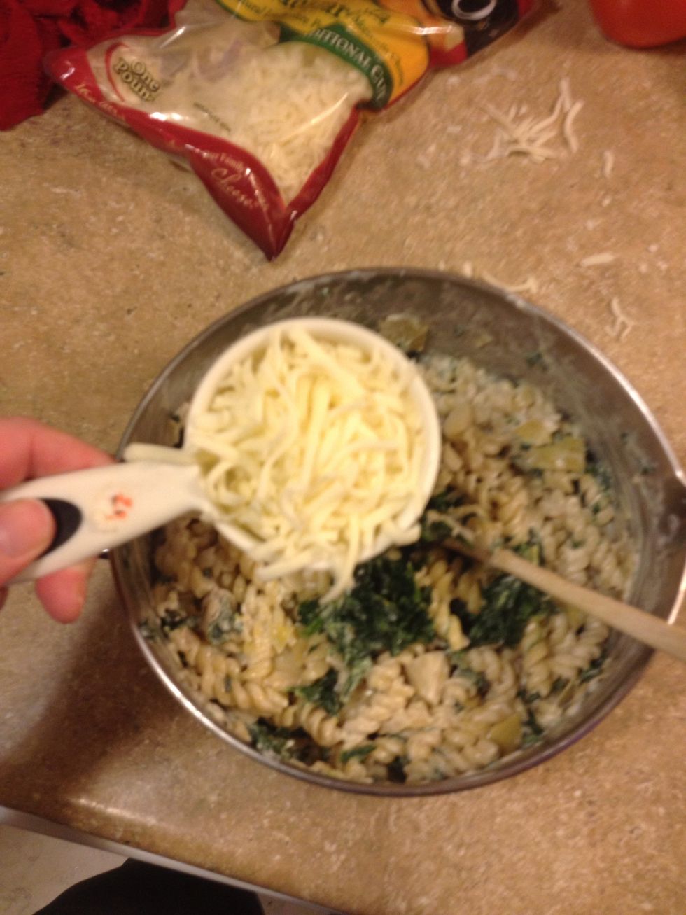 Add 1/2 c shredded mozzarella cheese