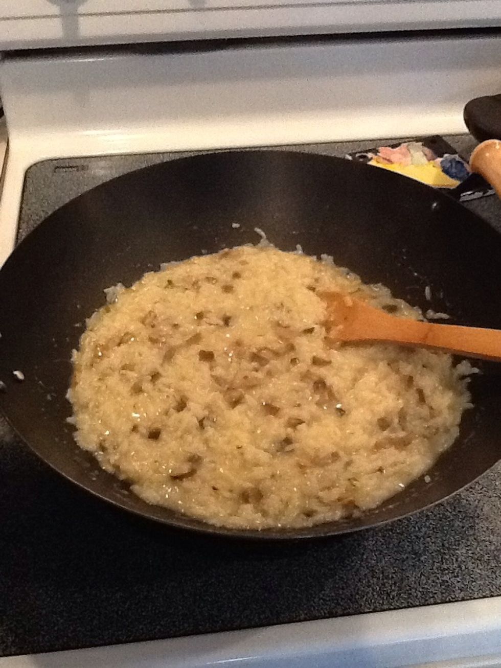 Add 1/2 cup chicken stock each time the previous amount is absorbed.  Stir constantly to keep rice creamy, not stuck to pan, for 25 minutes.  Feel free to have another glass of wine while you stir.