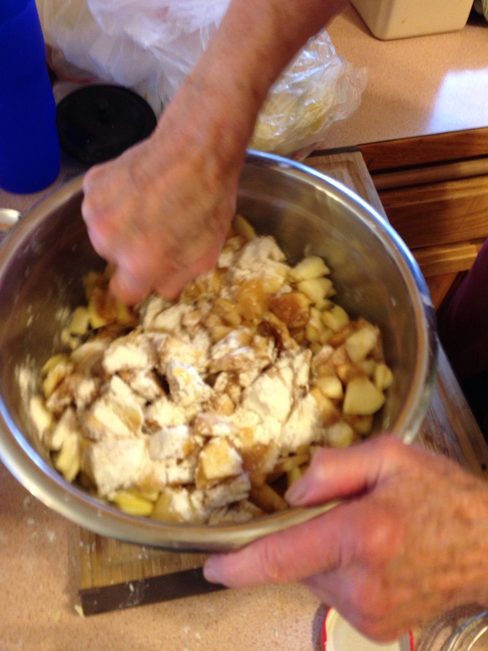 Add 1/2 cup flour, 1 cup sugar and 1.5 TBS cinnamon. Mix together.