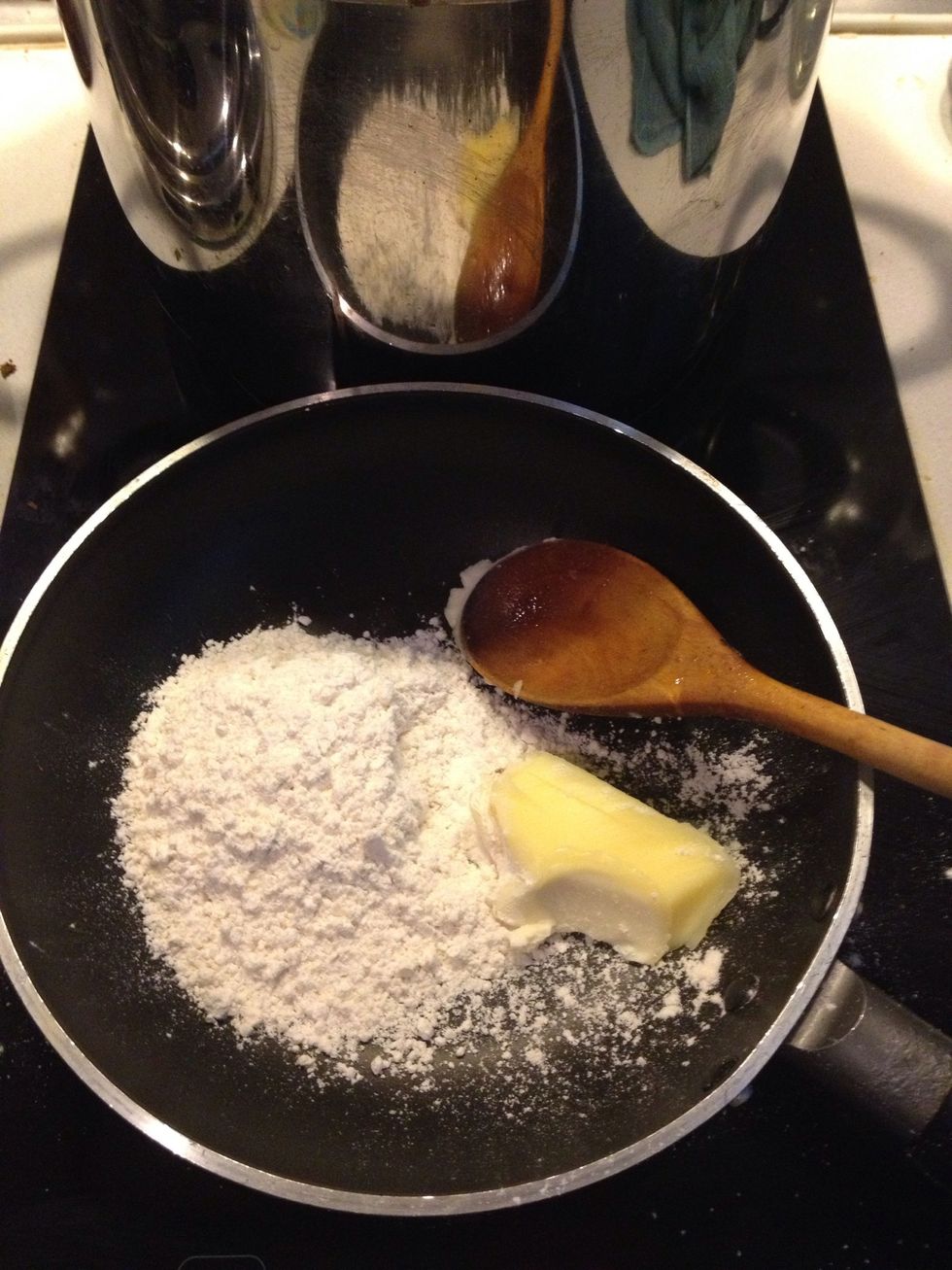 Add 1/2 cup flour and butter in a pan. U can put everything strait in if u r lazy. But u should have to stir it throughly or u'll have lumps