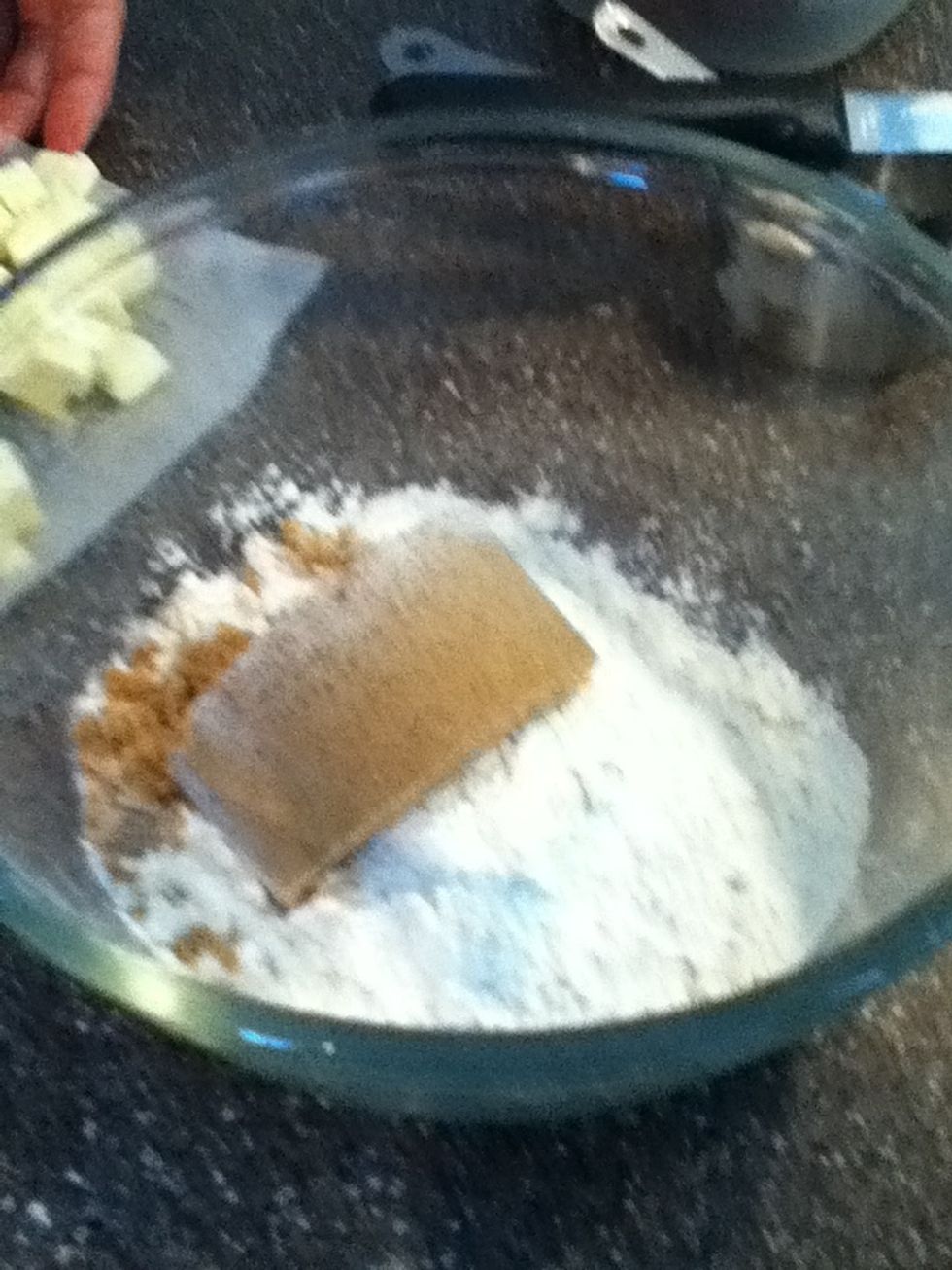 Add 1/2 cup of brown sugar to bowl 2