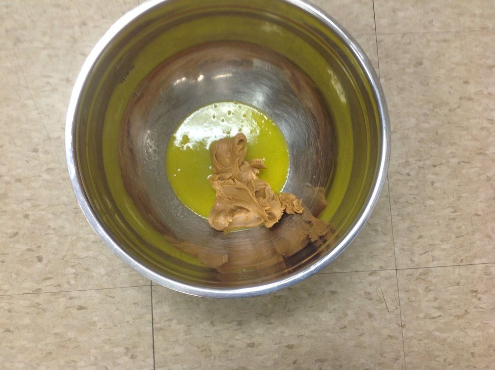 Add 1/2 cup of melted butter in the same bowl.