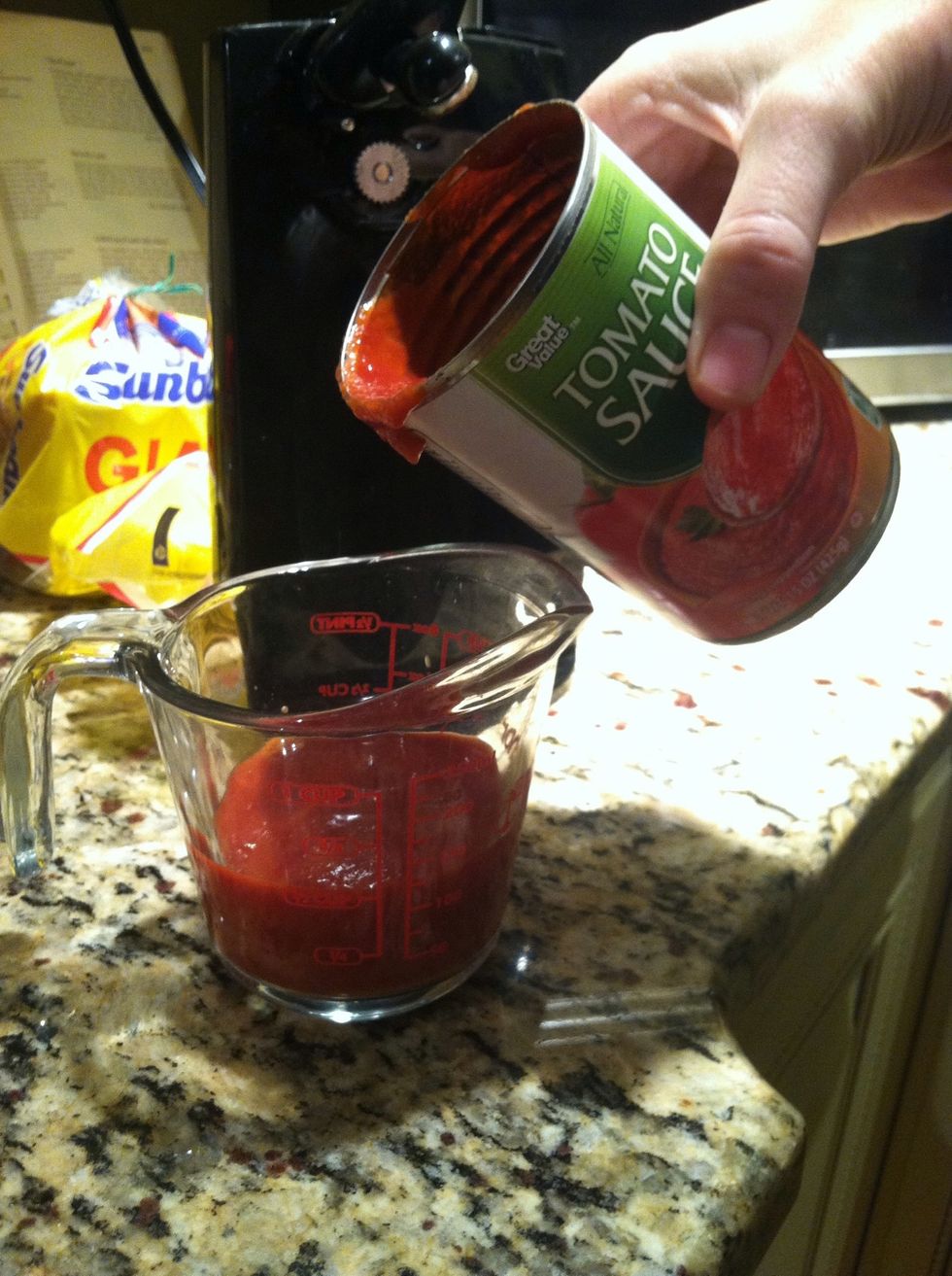 Add 1/2 cup of tomato sauce (save the rest for later)