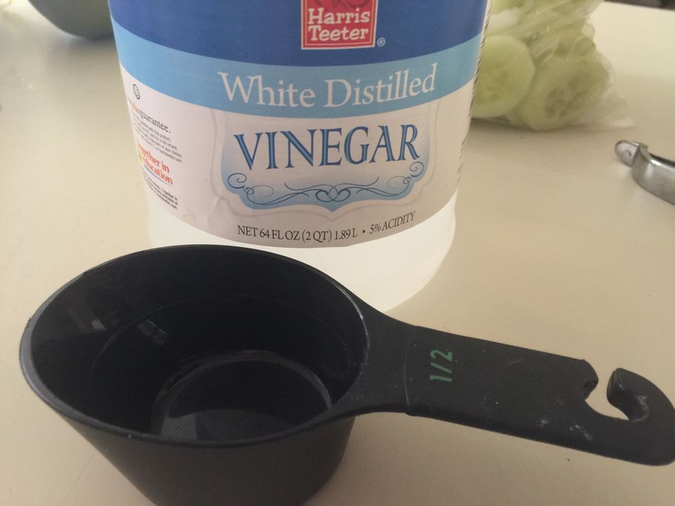 Add 1/2 cup vinegar.
