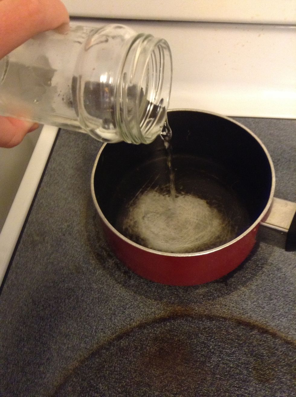 Add 1/2 cup water into small pot