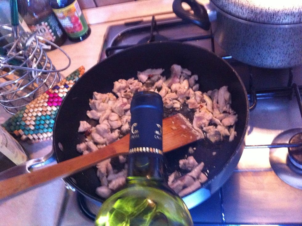 Add 1/2 glass of white wine and raise heat until the wine evaporates.