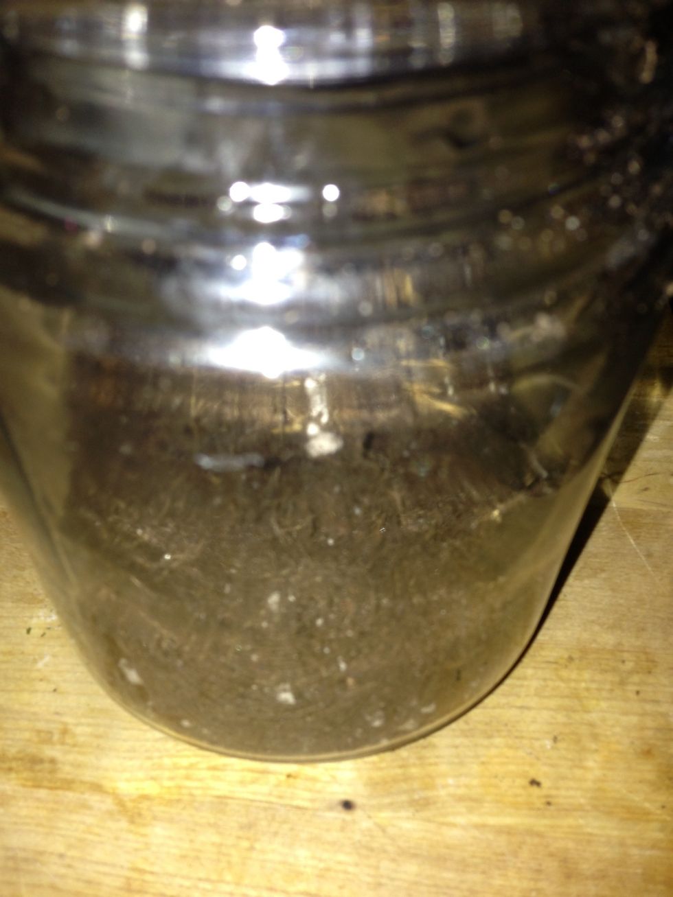 Add 1/2" of soil on top of charcoal.