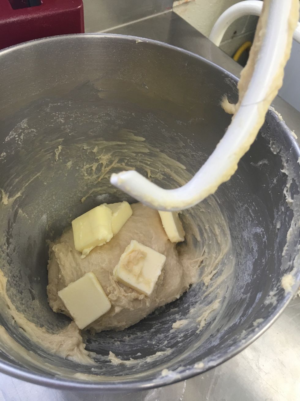 Add 1/2 of the softened butter. Mix on low for about two minutes.