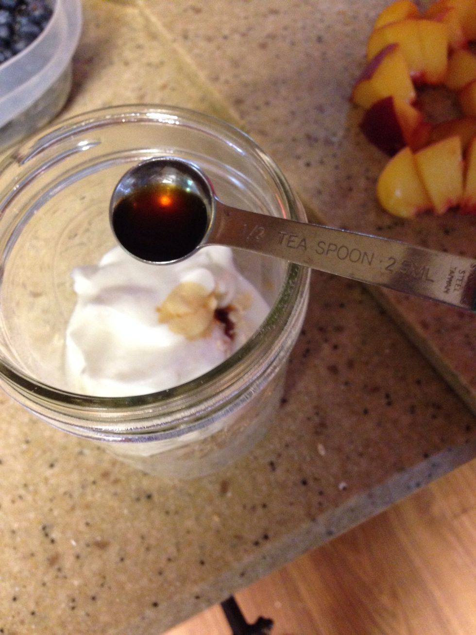 Add 1/2 tsp of vanilla extract to mason jar.