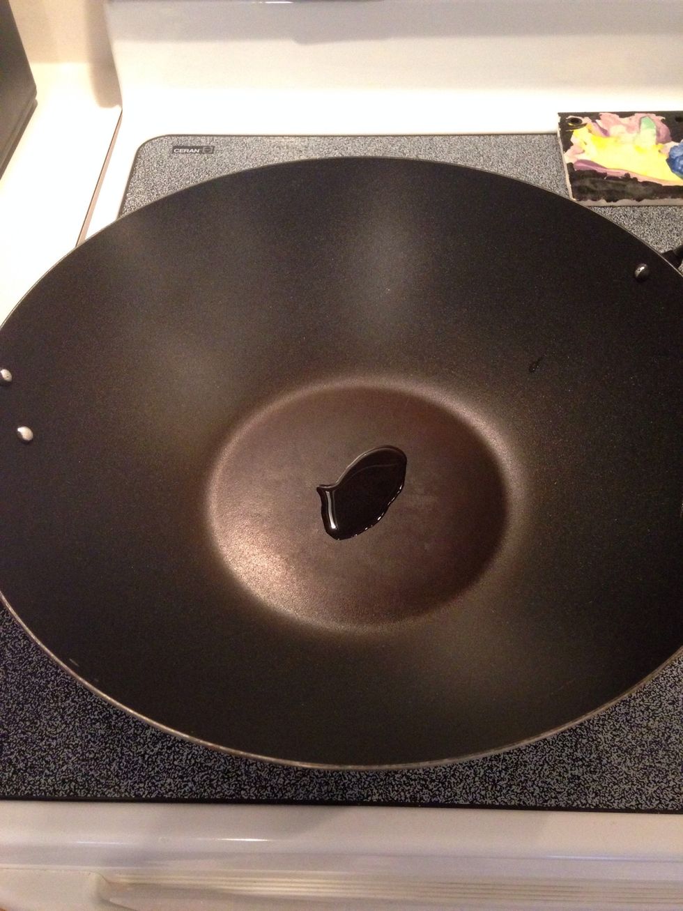 Add 1/2 tsp. sesame seed oil to wok or pan. Heat on medium high heat.