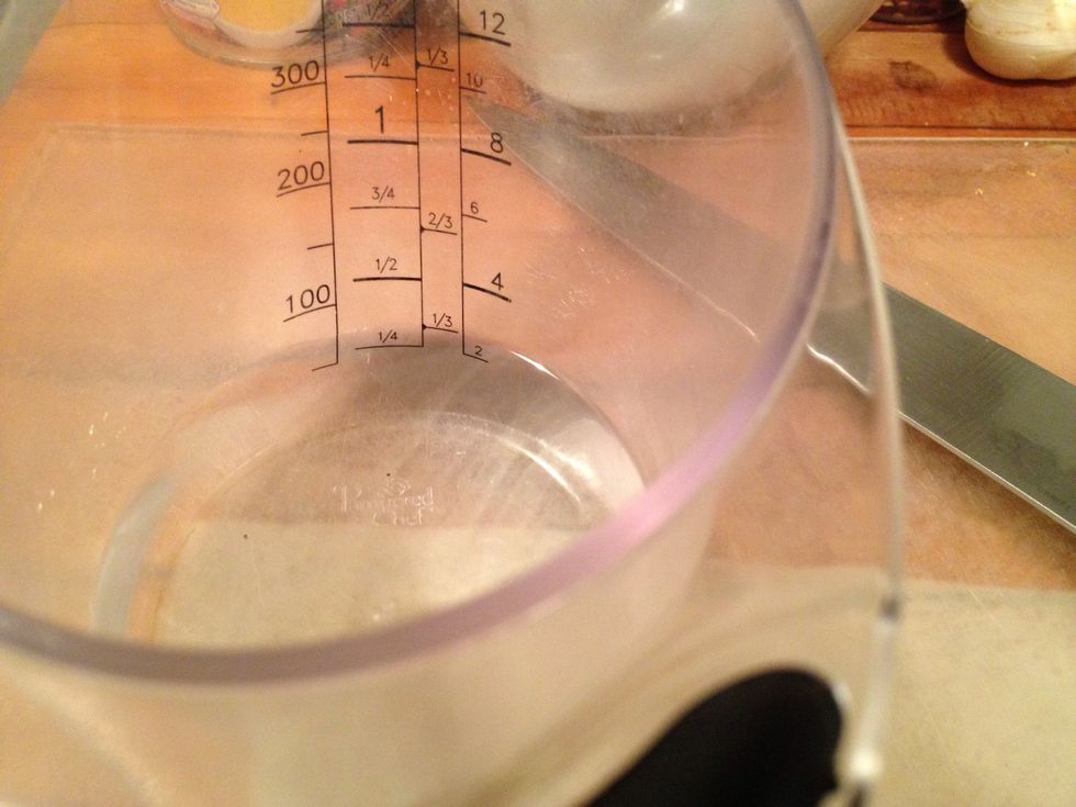 Add 1/3 cup dry white wine or like I mentioned, I am using a Taiwanese rice wine called  Michiu.  Be sure to cook it for a good minute or two to cook off most of the alcohol.