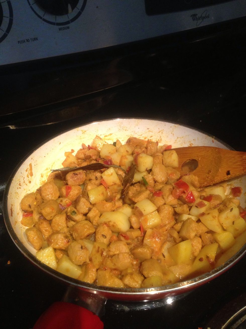Add 1/3 cup of water and keep cooking for 5 more minutes until the soya chunks and potato cubes soak all the spicy gravy and get cooked completely. Put the lid on so the aroma gets infused in the prep