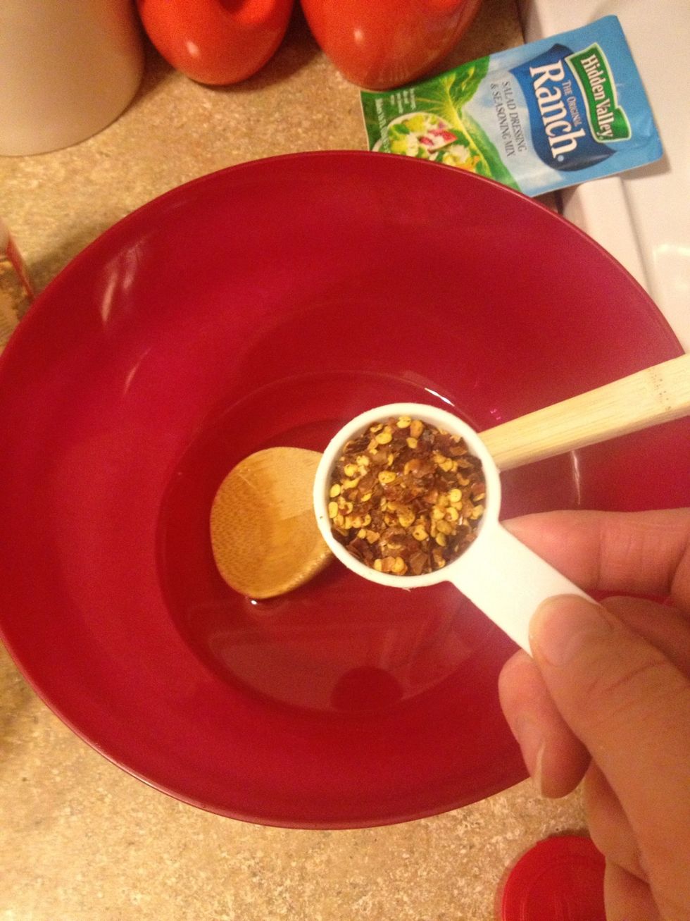 Add 1-3 tablespoons red pepper flakes (I use 2)