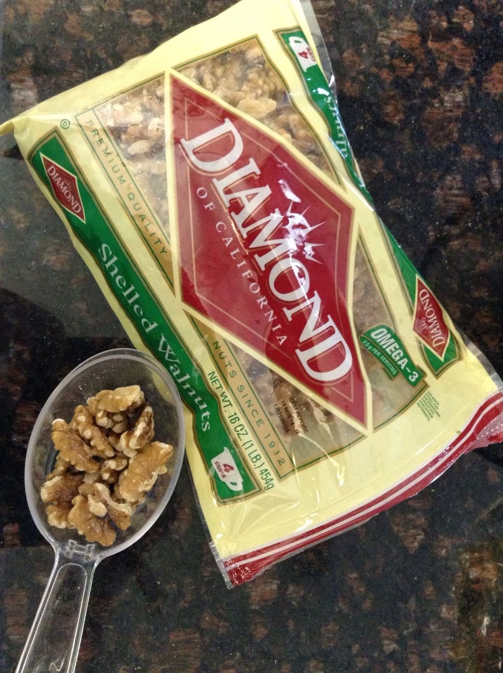 Add 1/4 cup chopped walnuts to the batter and mix with spatula until well blended.