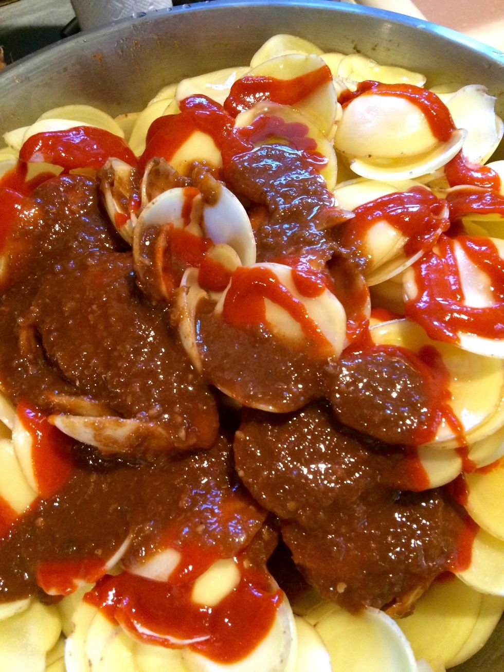 Add 1/4 cup extra virgin olive oil, 1/2 cup apple cider vinegar. Optional is hot sauce. I added about one cup of my favorite hot sauce, The Pepper Plant, and a good dose of sriracha.