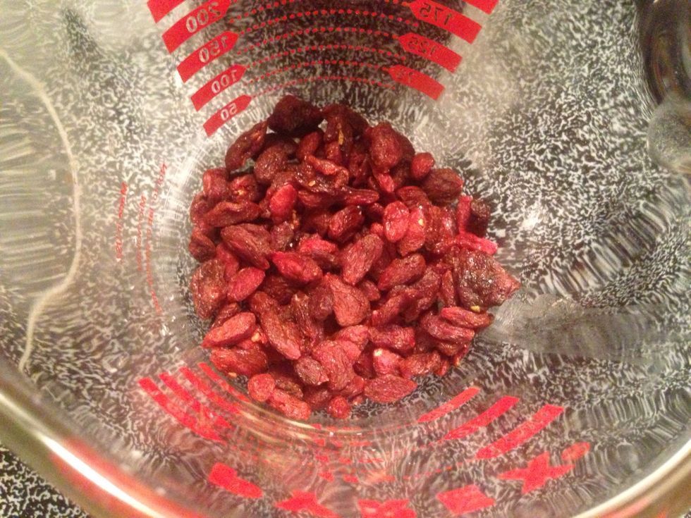 Add 1/4 cup of dried goji berries to mixture.