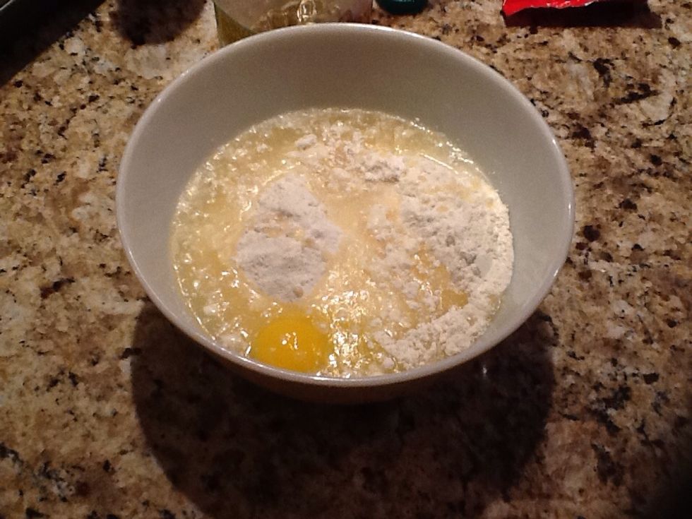 Add 1/4 cup of oil and water