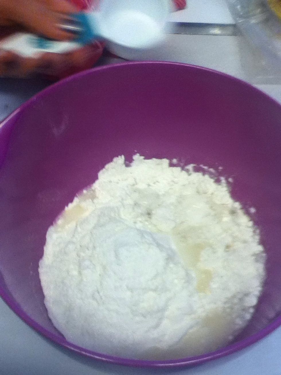 Add 1/4 cup of water and mix for a while then knead mixture until its of a clay consistency. Add the food coloring with some water otherwise it will go spotty not a full colour