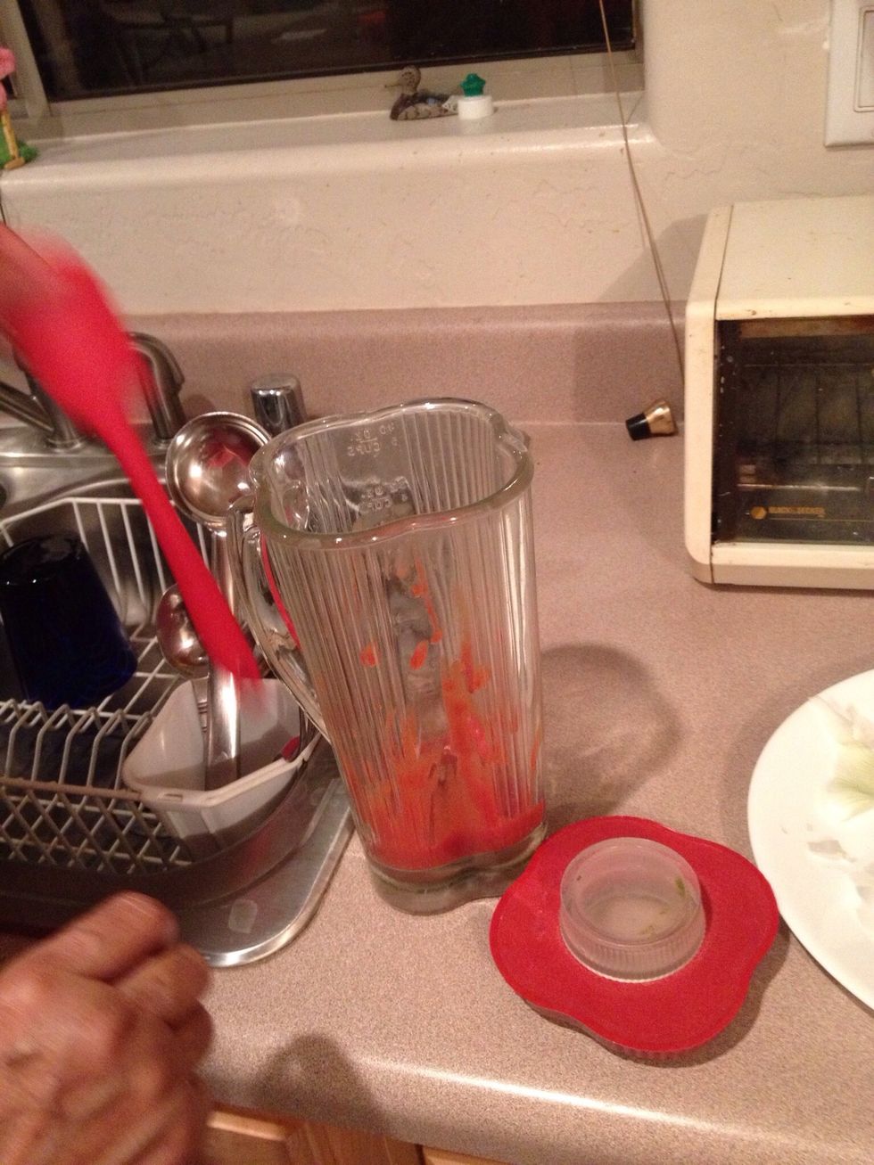 Add 1/4 cup tomato sauce into a blender.