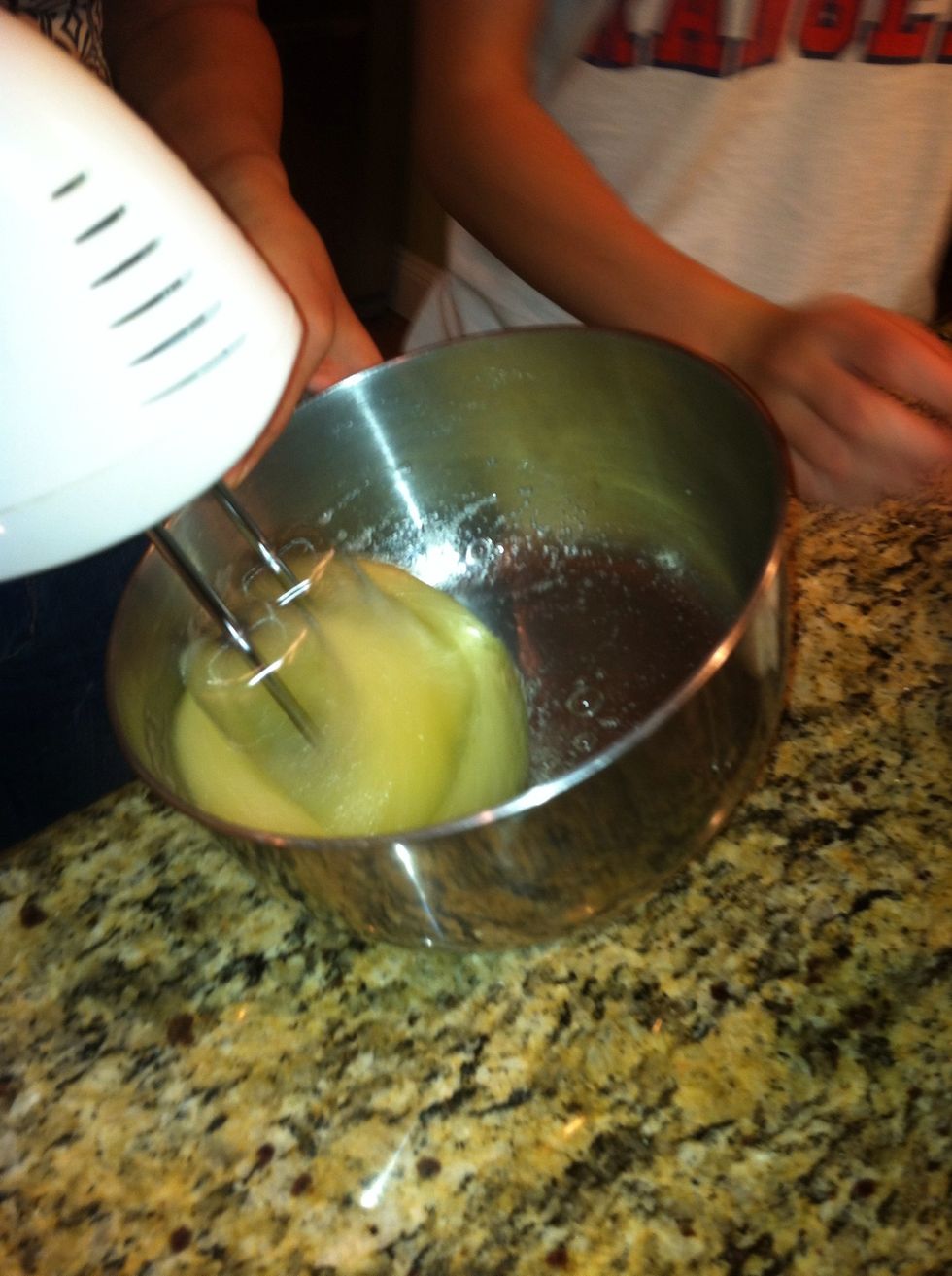 Add 1/4 sugar to the whites then mix until foamy