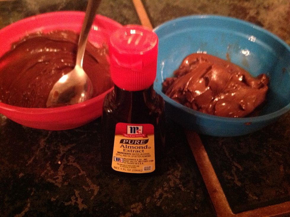 Add 1/4 teaspoon At MOST of Almond extract to the chocolate and Nutella